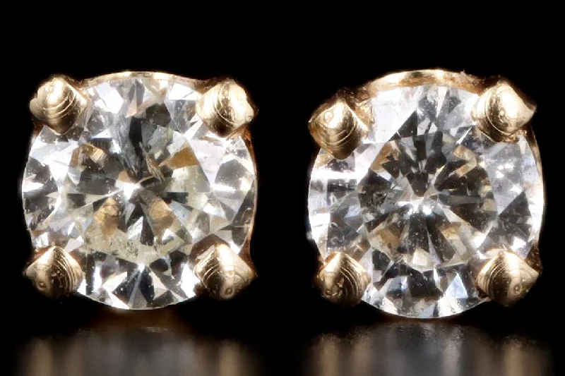 Modern 14K Yellow Gold .20 Carat Total Weight Diamond Stud Earrings