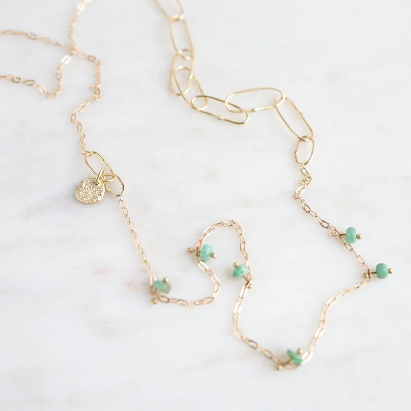 Gold Short Kitchen Sink with Emerald Necklace